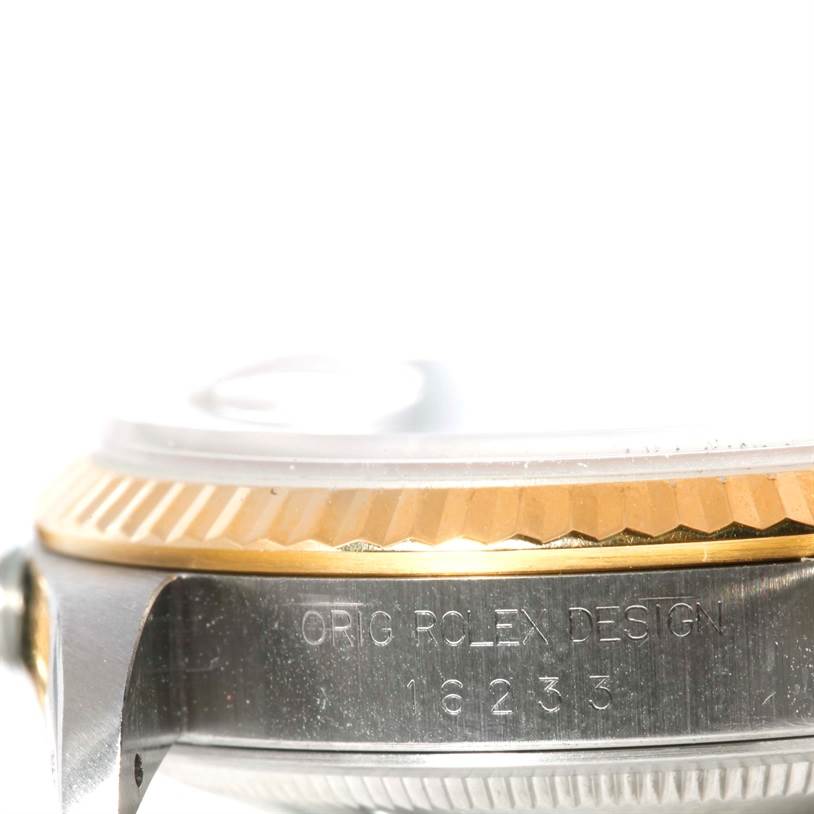 The image shows a close-up of the side profile of a Rolex Datejust 16233 Men's Steel and Gold (two tone) Champagne Dial 16233 Men's Steel and Gold (two tone) Champagne Dial watch, highlighting the case and the model number "16233".