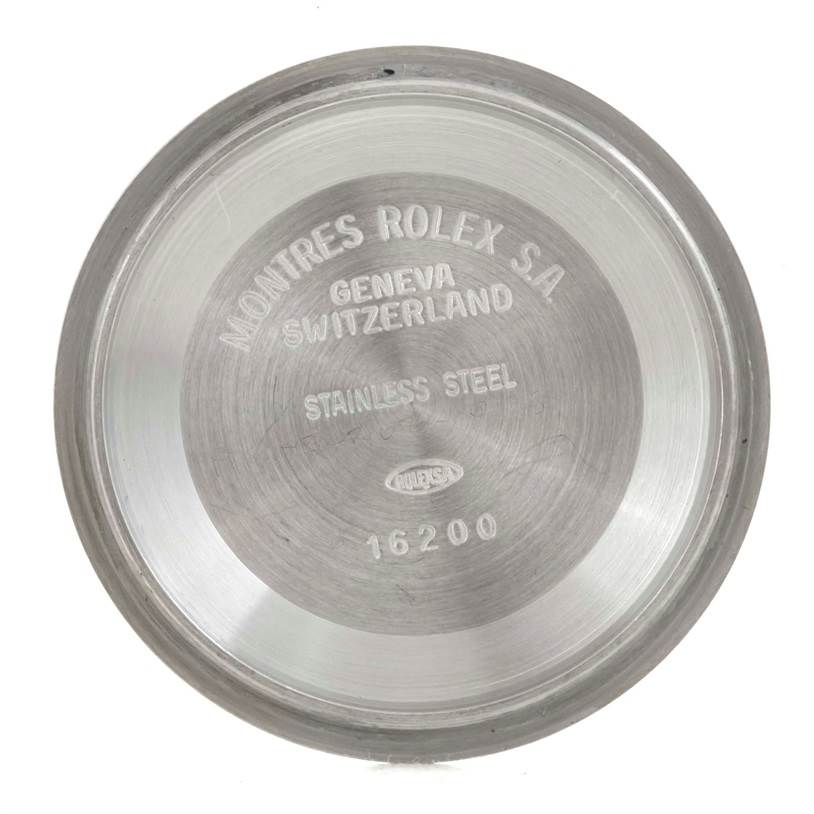 This is the stainless steel case back of a Rolex Datejust 16233 Men's Steel and Gold (two tone) Beige Dial 16233 Men's Steel and Gold (two tone) Beige Dial watch, viewed from the inside.