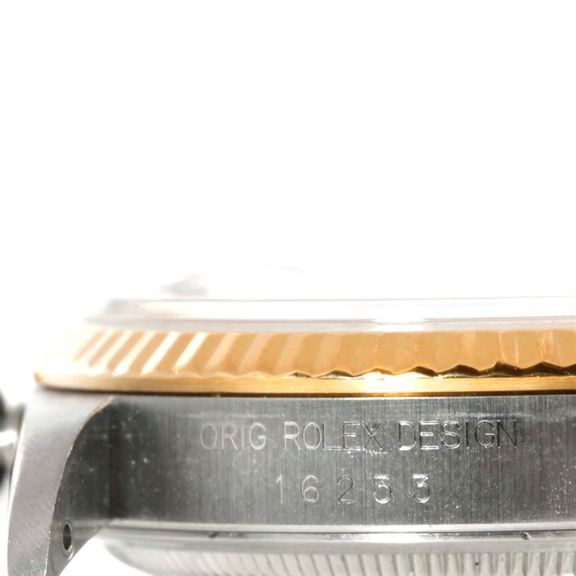 The image shows a close-up of the side of a Rolex Datejust 16233 Men's Steel and Gold (two tone) Beige Dial 16233 Men's Steel and Gold (two tone) Beige Dial watch, highlighting the case, bezel, and model number 16233.