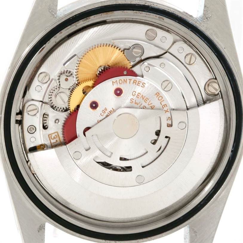 The image shows the intricate internal mechanism of the Rolex Datejust 16234 Men's Stainless Steel Silver Dial 16234 Men's Stainless Steel Silver Dial watch from a back view.