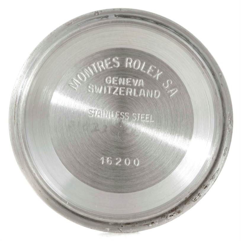 This image shows the underside of the case back of a Rolex Datejust 16234 Men's Stainless Steel Silver Dial 16234 Men's Stainless Steel Silver Dial model, engraved with brand details and model number.