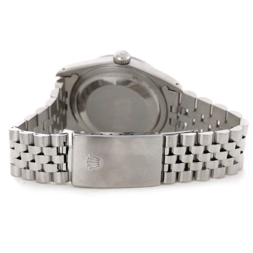 This image shows the clasp and case back of a Rolex Datejust 16220 Men's Stainless Steel Beige Dial 16220 Men's Stainless Steel Beige Dial watch from a rear angle.