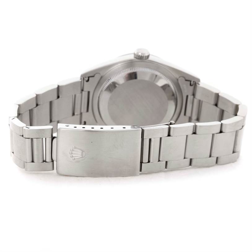 This image shows the back, clasp, and part of the bracelet of a Rolex Datejust 16220 Men's Stainless Steel Black Dial 16220 Men's Stainless Steel Black Dial watch.