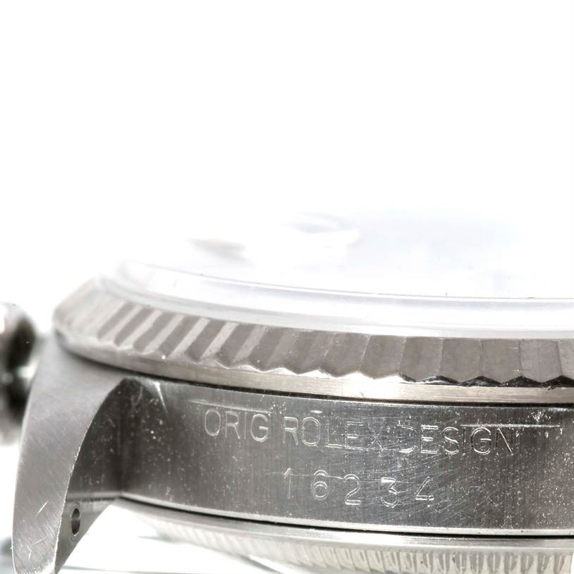 This side view shows the case, bezel, and crown of a Rolex Datejust 16234 Men's Stainless Steel Silver Dial 16234 Men's Stainless Steel Silver Dial model, with "Orig Rolex Design 16234" engraved.