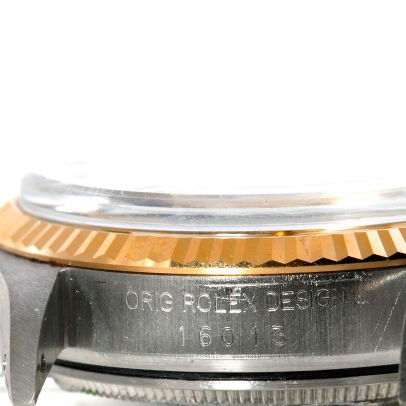 This image shows a close-up side view of the bezel and case of a Rolex Datejust 16013 Men's Stainless Steel Silver Dial 16013 Men's Stainless Steel Silver Dial model.