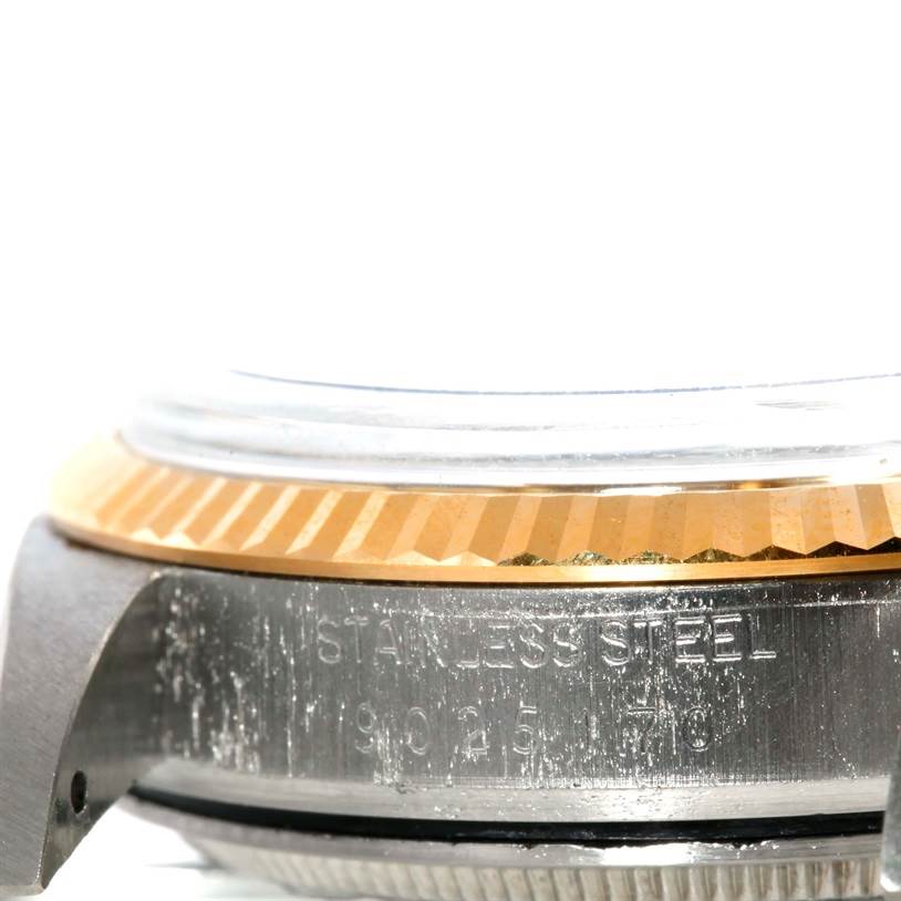 This image shows a side view of the Rolex Datejust 16013 Men's Stainless Steel Silver Dial 16013 Men's Stainless Steel Silver Dial watch, highlighting the stainless steel case and fluted bezel.