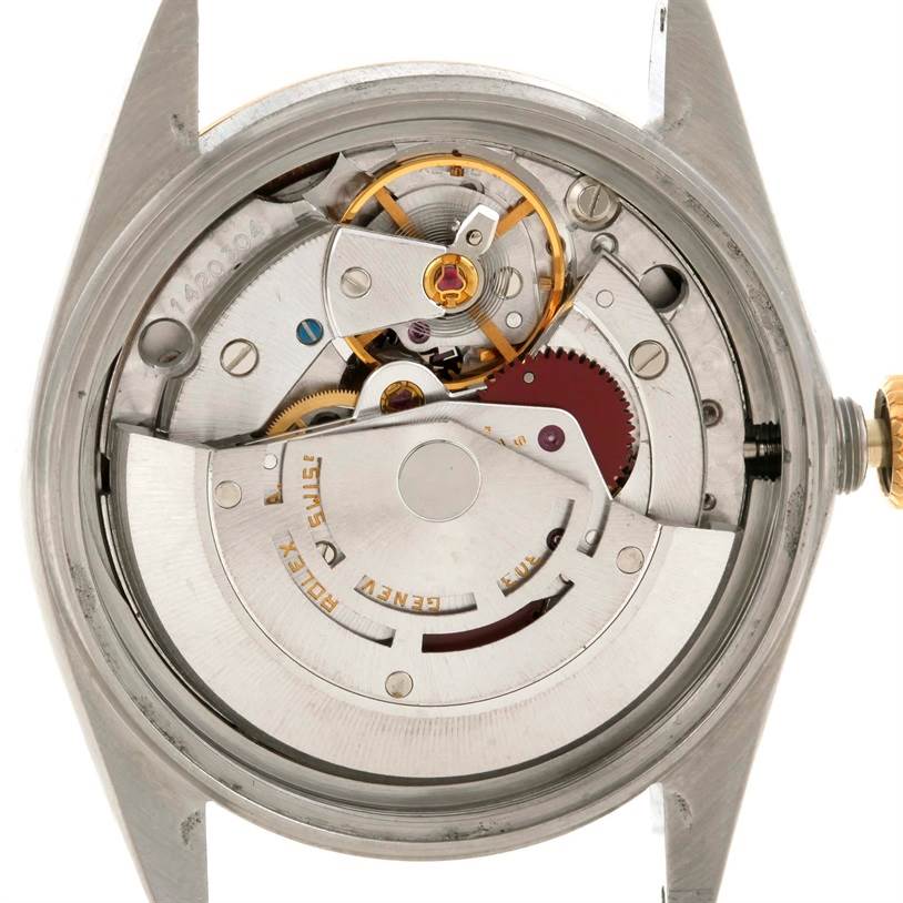 This image shows the back view of the Rolex Datejust 16013 Men's Stainless Steel Silver Dial 16013 Men's Stainless Steel Silver Dial model, revealing the detailed inner mechanical movement.