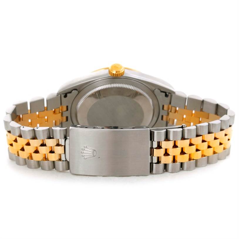 The image shows the back of a Rolex Datejust 16233 Men's Steel and Gold (two tone) Silver Dial 16233 Men's Steel and Gold (two tone) Silver Dial watch, highlighting the bracelet and clasp with the Rolex logo.