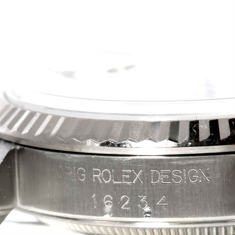 This image shows a close-up side view of the bezel and casing with the engraved model and brand of the Rolex Datejust 16234 Men's Stainless Steel Silver Dial 16234 Men's Stainless Steel Silver Dial watch.