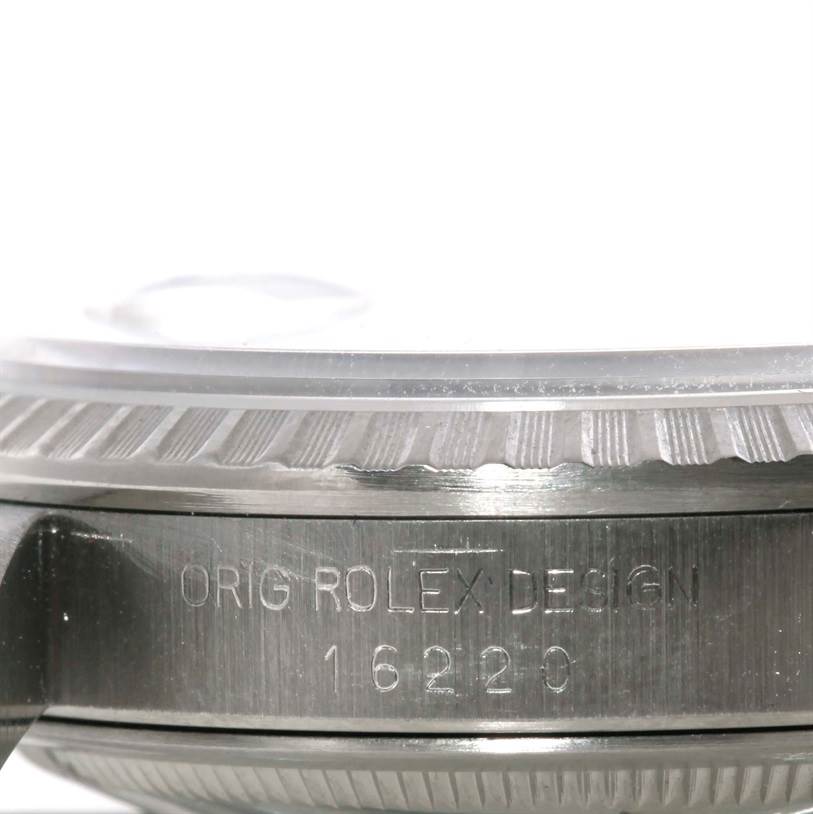 This image shows a close-up side view of the Datejust Rolex watch, highlighting its bezel and engraved model number "16220".