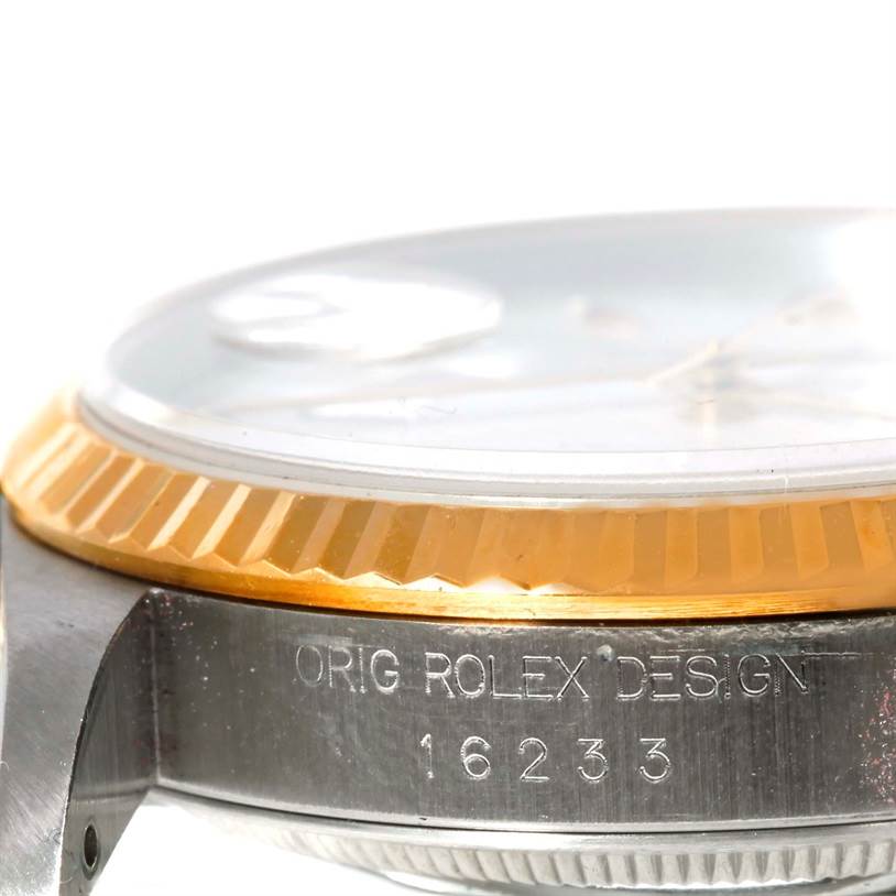 The image shows a close-up side view of the Rolex Datejust 16233 Men's Steel and Gold (two tone) White Dial 16233 Men's Steel and Gold (two tone) White Dial watch, highlighting the bezel, crystal, and case with model number 16233.
