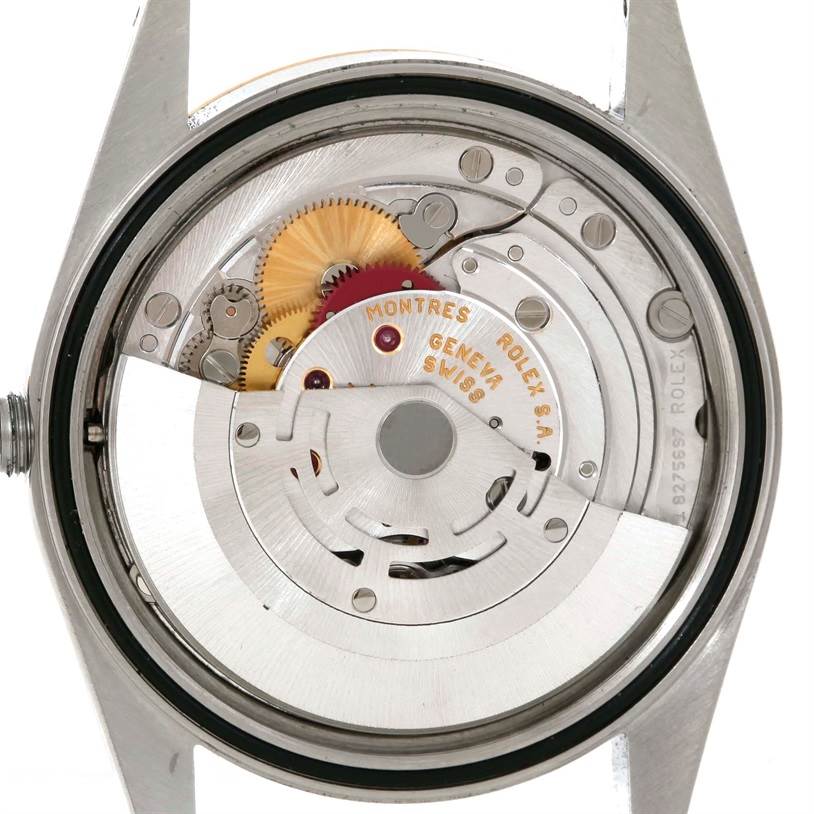 This image shows the internal mechanism of a Rolex Datejust 16233 Men's Steel and Gold (two tone) White Dial 16233 Men's Steel and Gold (two tone) White Dial watch from the back angle with the case back removed.