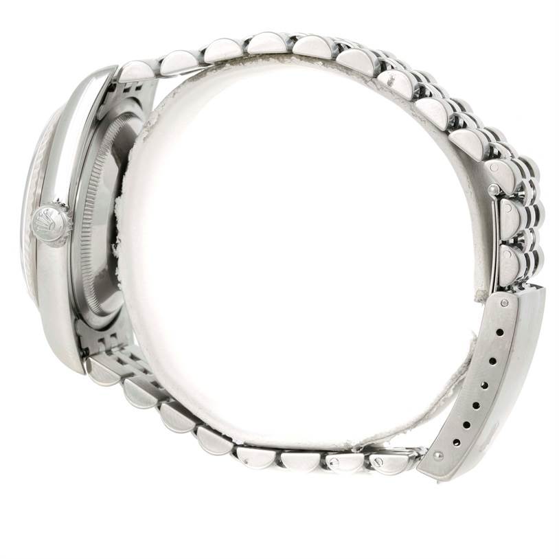 The image shows a side view of a Rolex Datejust 16234 Men's Stainless Steel Silver Dial 16234 Men's Stainless Steel Silver Dial watch focusing on the crown, case, and bracelet links.