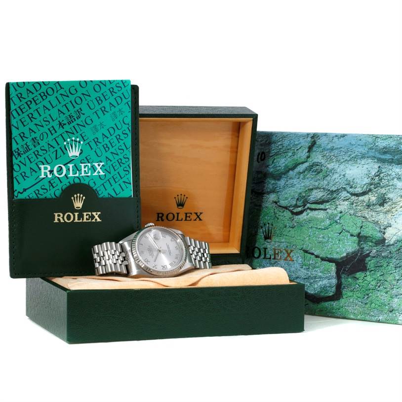 The image shows a Rolex Datejust 16234 Men's Stainless Steel Silver Dial 16234 Men's Stainless Steel Silver Dial watch alongside its opened branded box, card holder, and a patterned outer box.