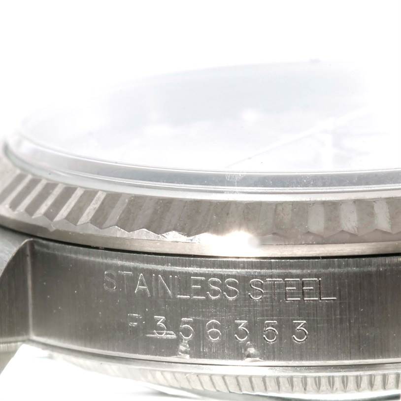 The image shows a close-up side view of a stainless steel bezel and case from a Rolex Datejust 16234 Men's Stainless Steel Silver Dial 16234 Men's Stainless Steel Silver Dial watch.