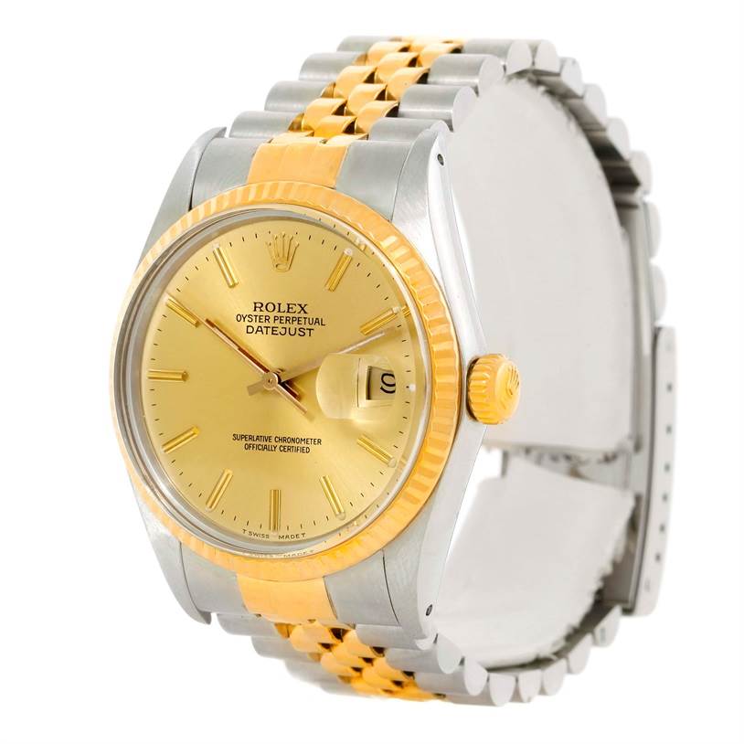 The image shows a front angle of a Rolex Datejust 16013 Men's Stainless Steel Champagne Dial 16013 Men's Stainless Steel Champagne Dial watch, highlighting its gold and silver bracelet and gold dial.