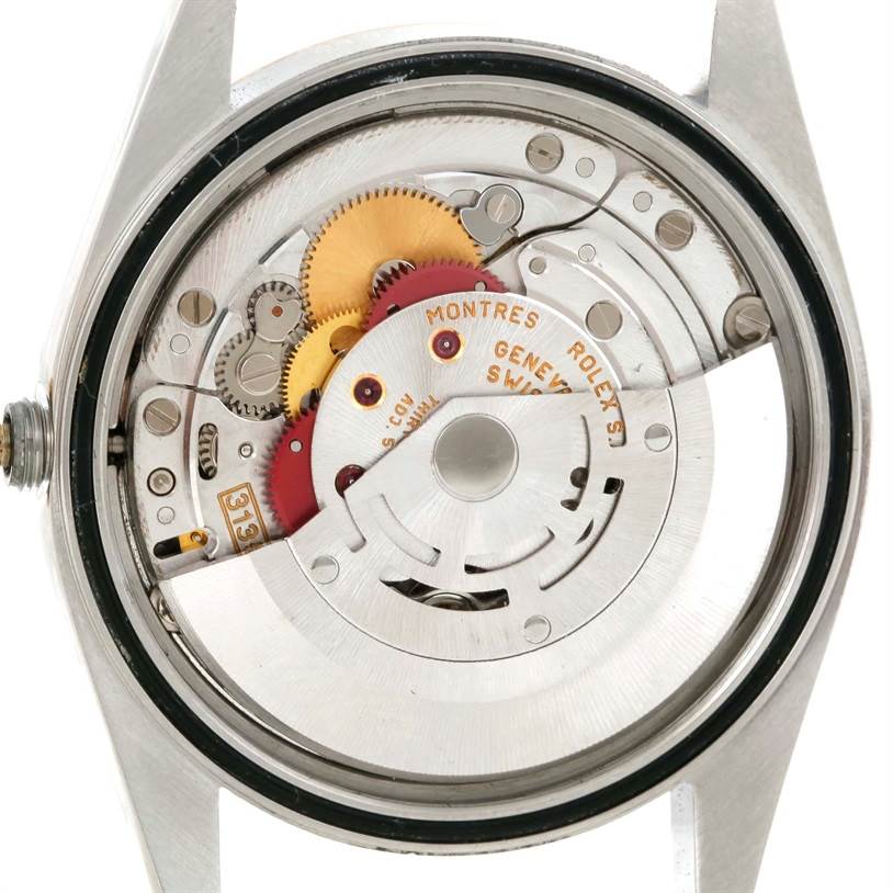 The image shows a close-up view of the internal mechanism of a Rolex Datejust 16233 Men's Steel and Gold (two tone) Champagne Dial 16233 Men's Steel and Gold (two tone) Champagne Dial, specifically highlighting the movement components.