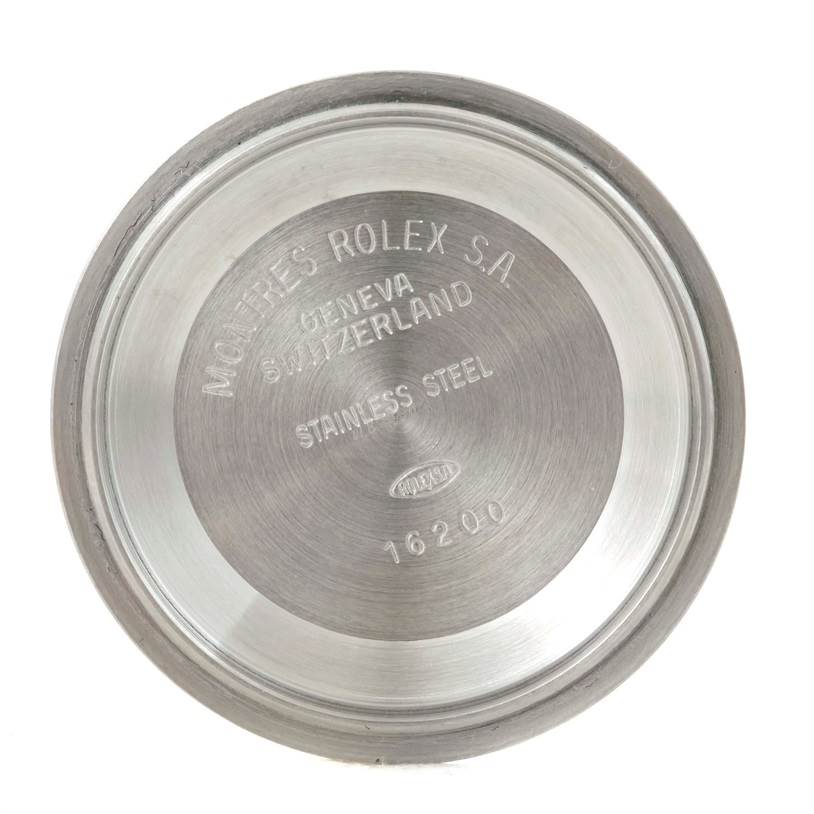 This image shows the inner case back of a Rolex Datejust 16233 Men's Steel and Gold (two tone) Champagne Dial 16233 Men's Steel and Gold (two tone) Champagne Dial watch, featuring engraving details.