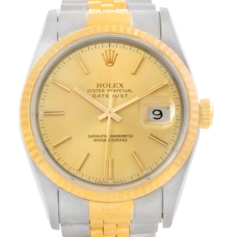 This image shows a front view of the Rolex Datejust 16233 Men's Steel and Gold (two tone) Champagne Dial 16233 Men's Steel and Gold (two tone) Champagne Dial watch, highlighting the gold dial, fluted bezel, and date window.