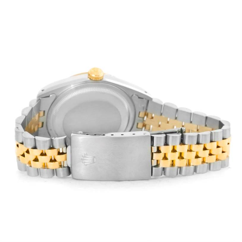 The image shows the back case, crown, and two-tone bracelet with clasp of a Rolex Datejust 16233 Men's Steel and Gold (two tone) Champagne Dial 16233 Men's Steel and Gold (two tone) Champagne Dial watch.