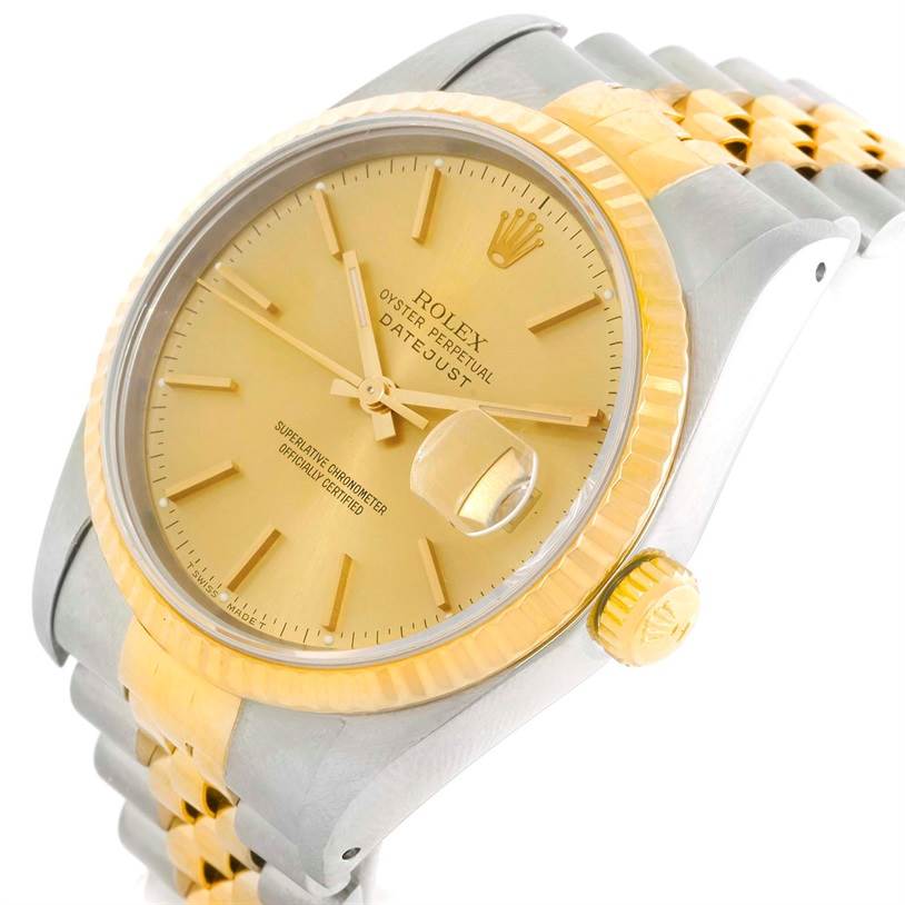 The photo shows a close-up angled view of the Rolex Datejust 16233 Men's Steel and Gold (two tone) Champagne Dial 16233 Men's Steel and Gold (two tone) Champagne Dial watch face, bezel, crown, and bracelet.