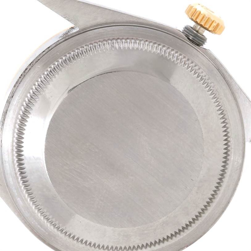 This is a close-up angle showing the case and crown of a Rolex Datejust 16233 Men's Steel and Gold (two tone) Champagne Dial 16233 Men's Steel and Gold (two tone) Champagne Dial watch.