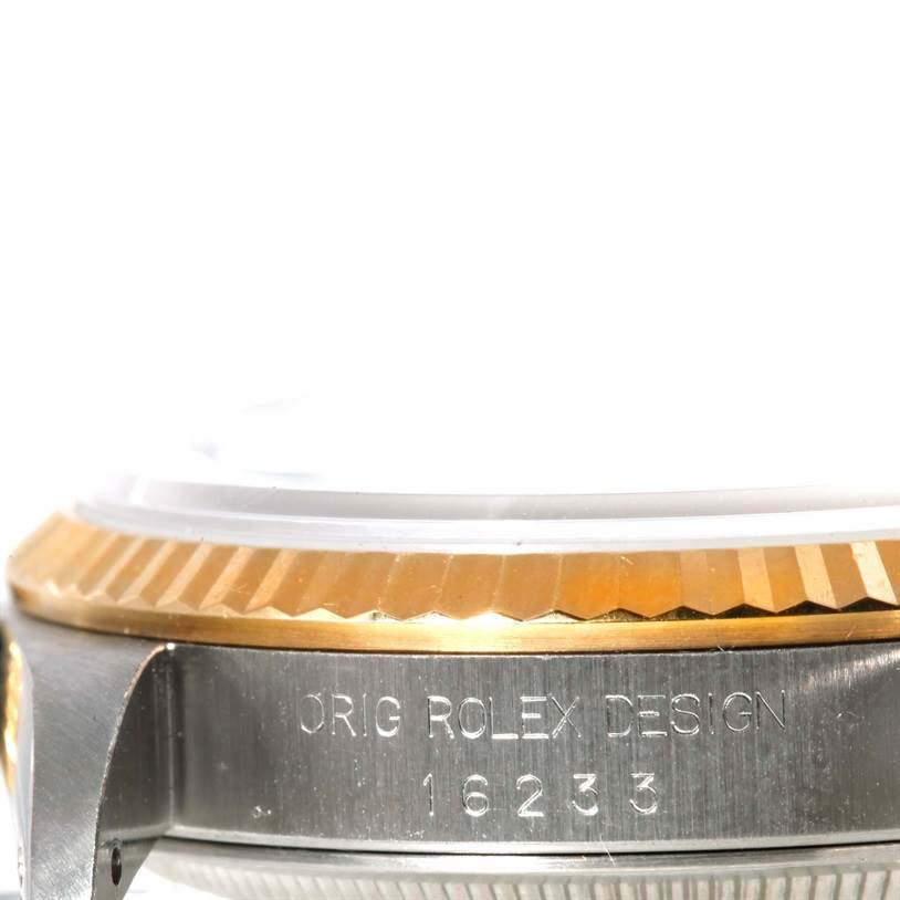 The image shows a side view of the case and bezel of a Rolex Datejust 16233 Men's Steel and Gold (two tone) Black Dial 16233 Men's Steel and Gold (two tone) Black Dial model, with the model number 16233 engraved.