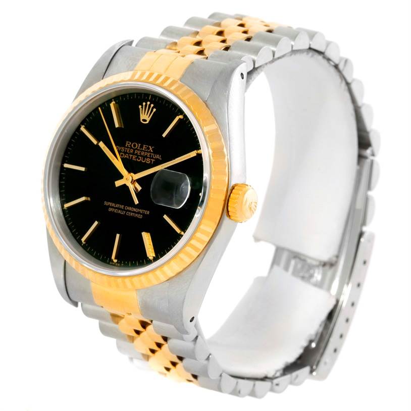 The image shows a Rolex Datejust 16233 Men's Steel and Gold (two tone) Black Dial 16233 Men's Steel and Gold (two tone) Black Dial watch at a slight angle, highlighting its black dial, gold bezel, and two-tone metal strap.