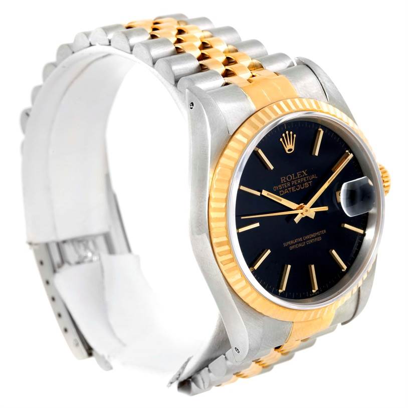 The Rolex Datejust 16233 Men's Steel and Gold (two tone) Black Dial 16233 Men's Steel and Gold (two tone) Black Dial watch is shown at an angle featuring its face and bracelet with a gold and silver finish.