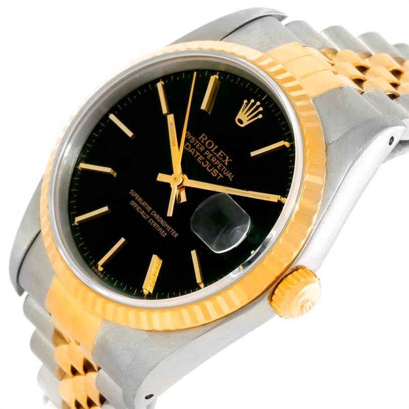 The watch is a Rolex Datejust 16233 Men's Steel and Gold (two tone) Black Dial 16233 Men's Steel and Gold (two tone) Black Dial model, shown from an angled close-up capturing the face, bezel, and part of the bracelet.