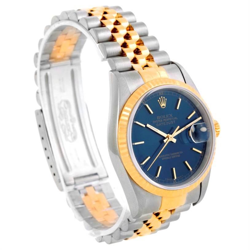 The image shows a side angle of a Rolex Datejust 16233 Men's Steel and Gold (two tone) Blue Dial 16233 Men's Steel and Gold (two tone) Blue Dial watch, highlighting the face, bezel, and two-tone bracelet.