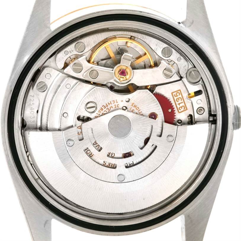 The image shows the internal mechanical movement of a Rolex Datejust 16233 Men's Steel and Gold (two tone) Blue Dial 16233 Men's Steel and Gold (two tone) Blue Dial watch from a back view angle.