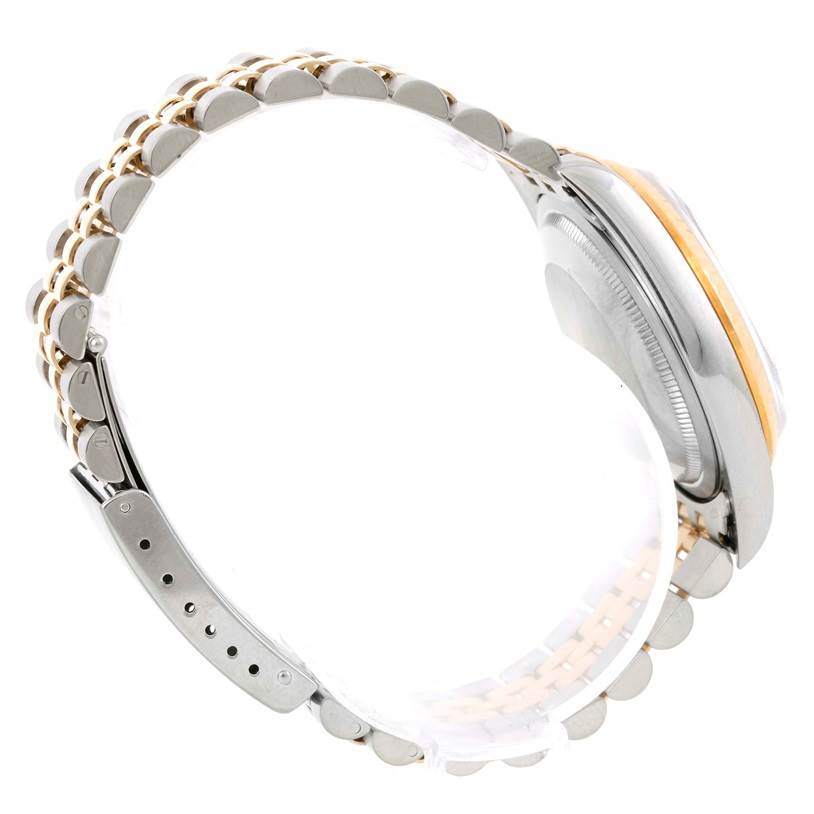 The image shows a side view of the Rolex Datejust 16233 Men's Steel and Gold (two tone) Blue Dial 16233 Men's Steel and Gold (two tone) Blue Dial watch focusing on the bracelet and clasp.