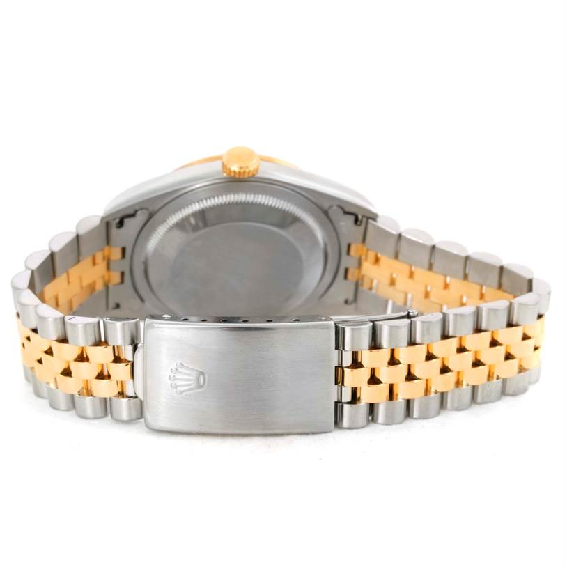 The image shows the back view of a Rolex Datejust 16233 Men's Steel and Gold (two tone) Blue Dial 16233 Men's Steel and Gold (two tone) Blue Dial watch, highlighting the two-tone bracelet and clasp.