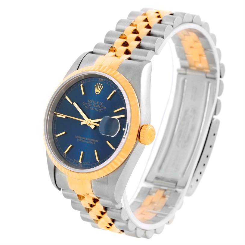 This Rolex Datejust 16233 Men's Steel and Gold (two tone) Blue Dial 16233 Men's Steel and Gold (two tone) Blue Dial watch is shown at an angle displaying the face, bezel, crown, and two-tone metal bracelet.