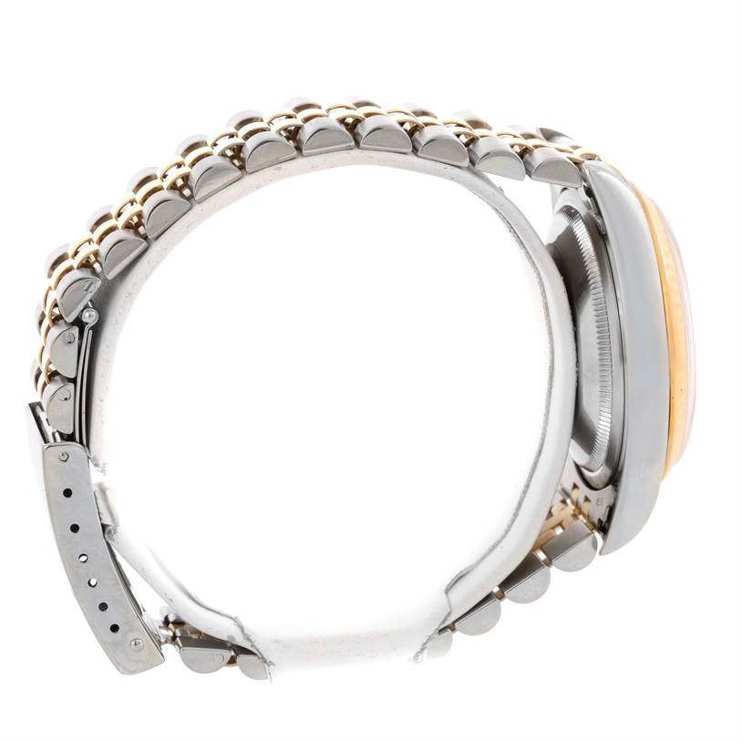 This image shows a side view of the Rolex Datejust 16233 Men's Steel and Gold (two tone) Champagne Dial 16233 Men's Steel and Gold (two tone) Champagne Dial watch, highlighting the bracelet and part of the case and bezel.