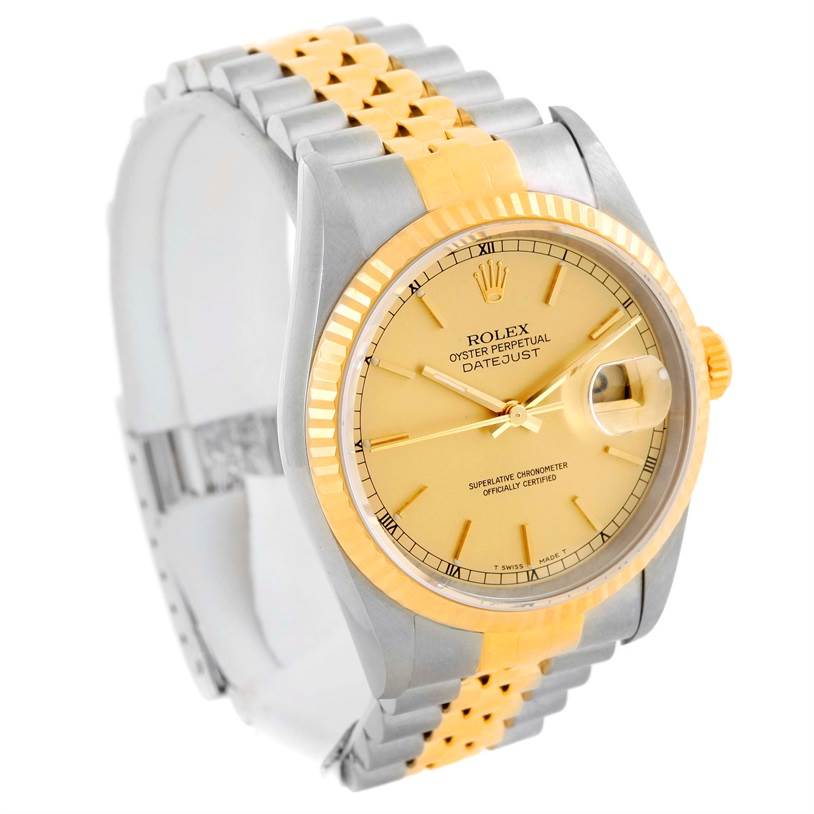 This Rolex Datejust 16233 Men's Steel and Gold (two tone) Champagne Dial 16233 Men's Steel and Gold (two tone) Champagne Dial watch is shown from an angled side view, highlighting the dial, fluted bezel, and two-tone bracelet.