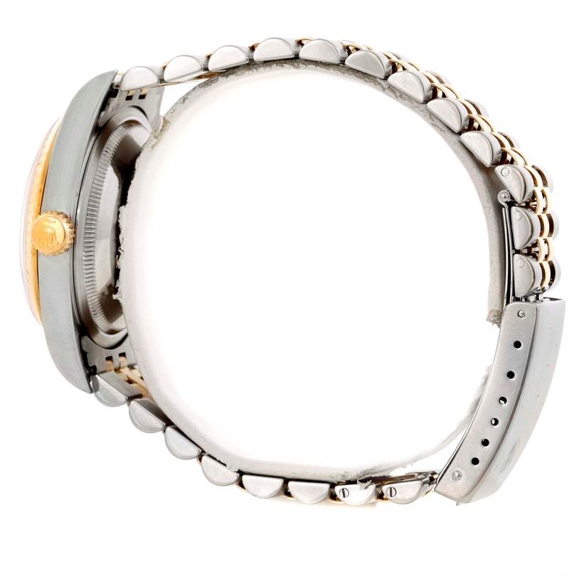 This image shows a side view of a Rolex Datejust 16233 Men's Steel and Gold (two tone) Champagne Dial 16233 Men's Steel and Gold (two tone) Champagne Dial watch, focusing on the bracelet, crown, and case.