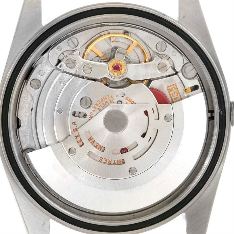 The image shows the back case of a Rolex Datejust 16233 Men's Steel and Gold (two tone) Black Dial 16233 Men's Steel and Gold (two tone) Black Dial watch, revealing its intricate movement and internal components.