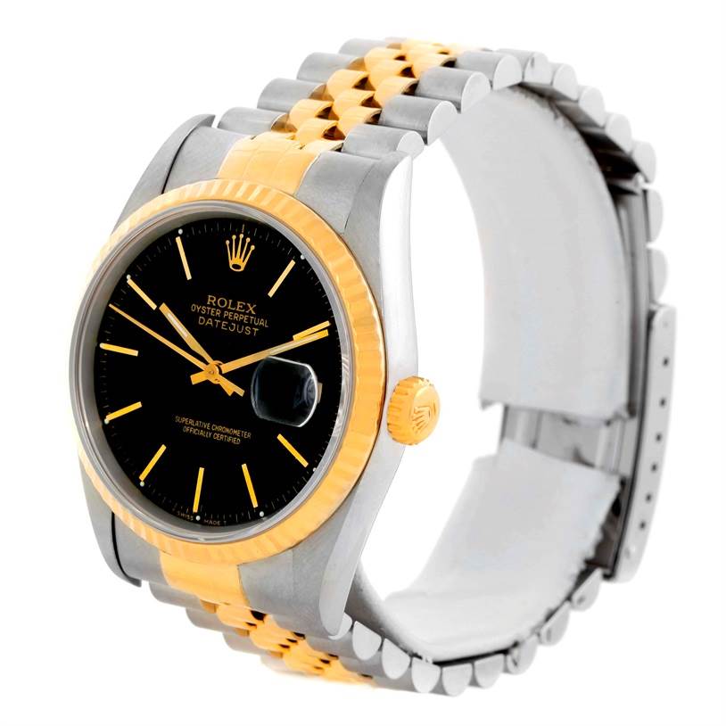 The image shows a Rolex Datejust 16233 Men's Steel and Gold (two tone) Black Dial 16233 Men's Steel and Gold (two tone) Black Dial watch at an angle highlighting its black dial, fluted bezel, and two-tone bracelet.