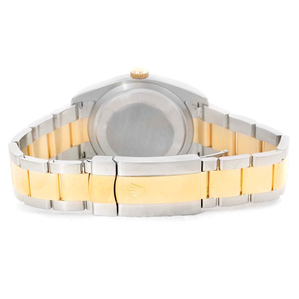 The image shows the back and bracelet of a Rolex Datejust 116203 Men's Stainless Steel Black Dial 116203 Men's Stainless Steel Black Dial watch, highlighting its two-tone metal band.