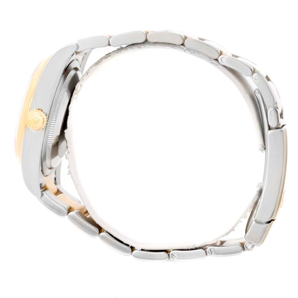 The image shows a side view of a Rolex Datejust 116203 Men's Stainless Steel Black Dial 116203 Men's Stainless Steel Black Dial watch, displaying the bracelet and crown.