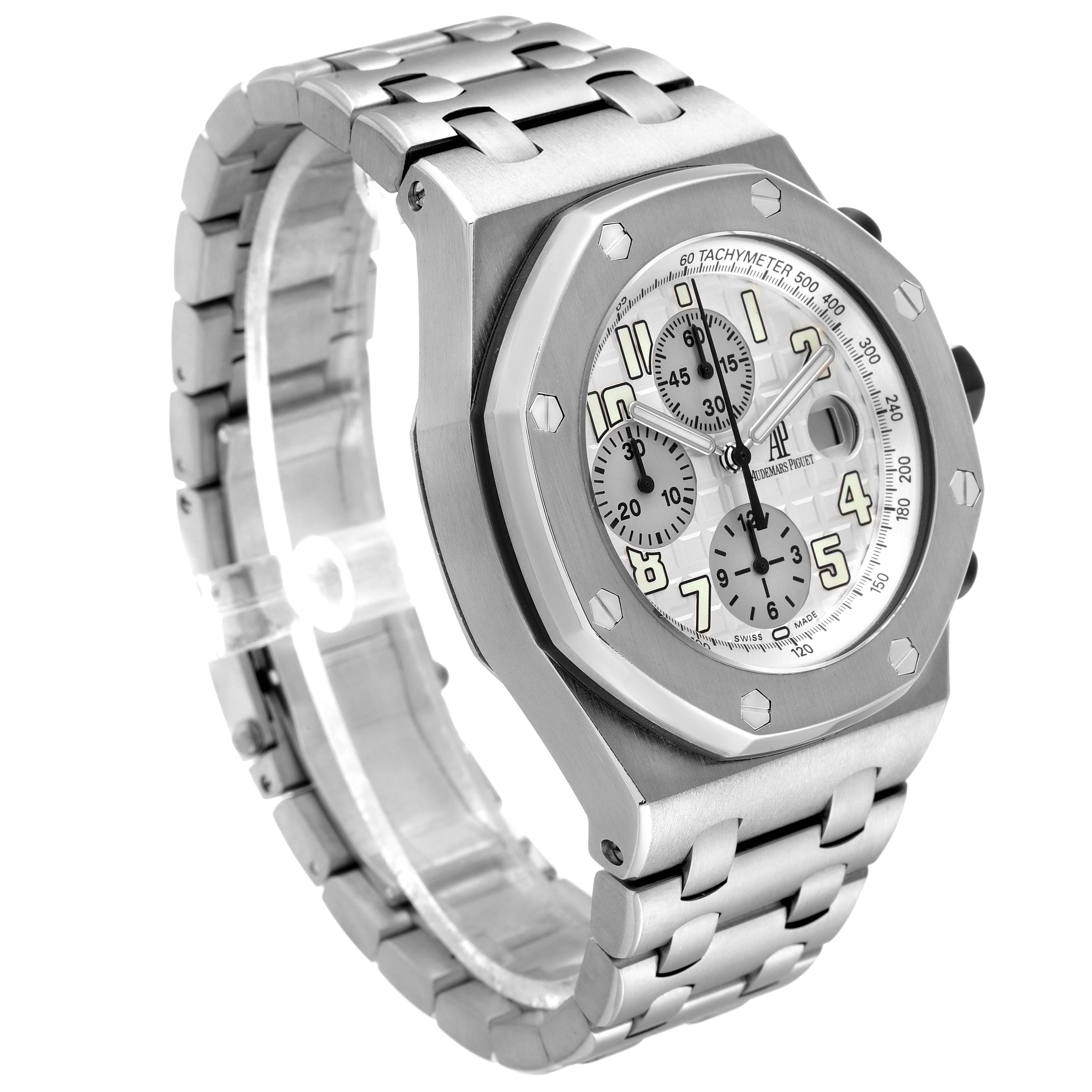 The image shows a side angle of a Royal Oak Offshore model by Audemars Piguet, highlighting the watch face and metal bracelet.