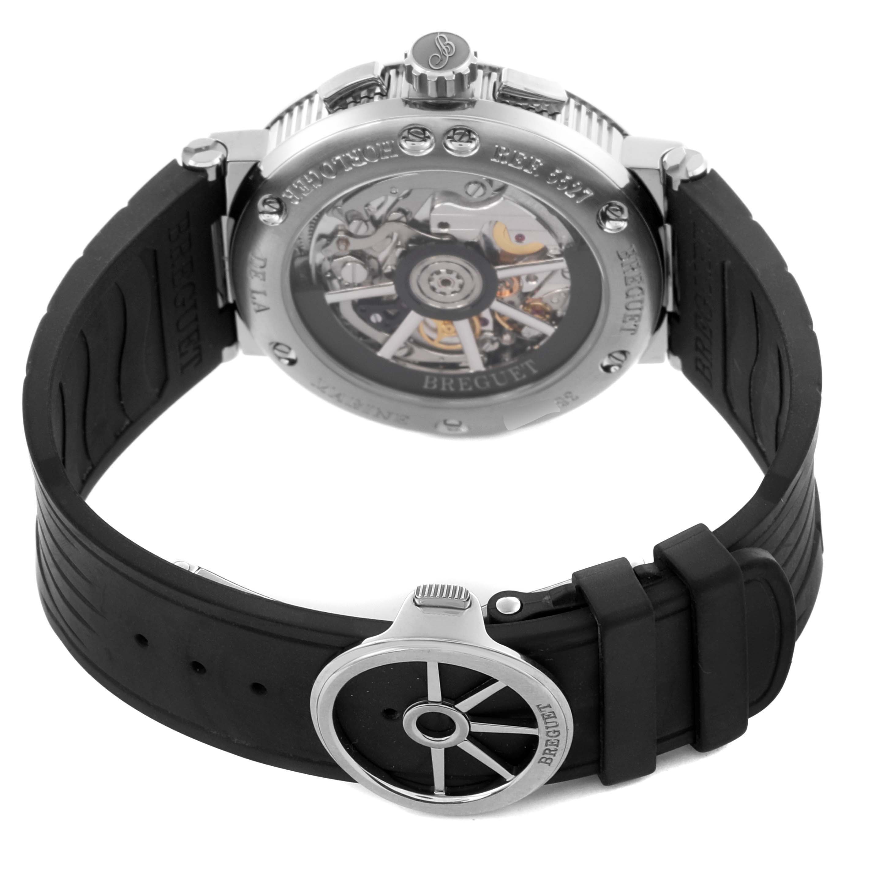 The Breguet Marine 5527TI/G2/9WV Men's Titanium Grey Dial 5527TI/G2/9WV Men's Titanium Grey Dial model watch is shown from the back angle, highlighting its transparent case back and rubber strap.