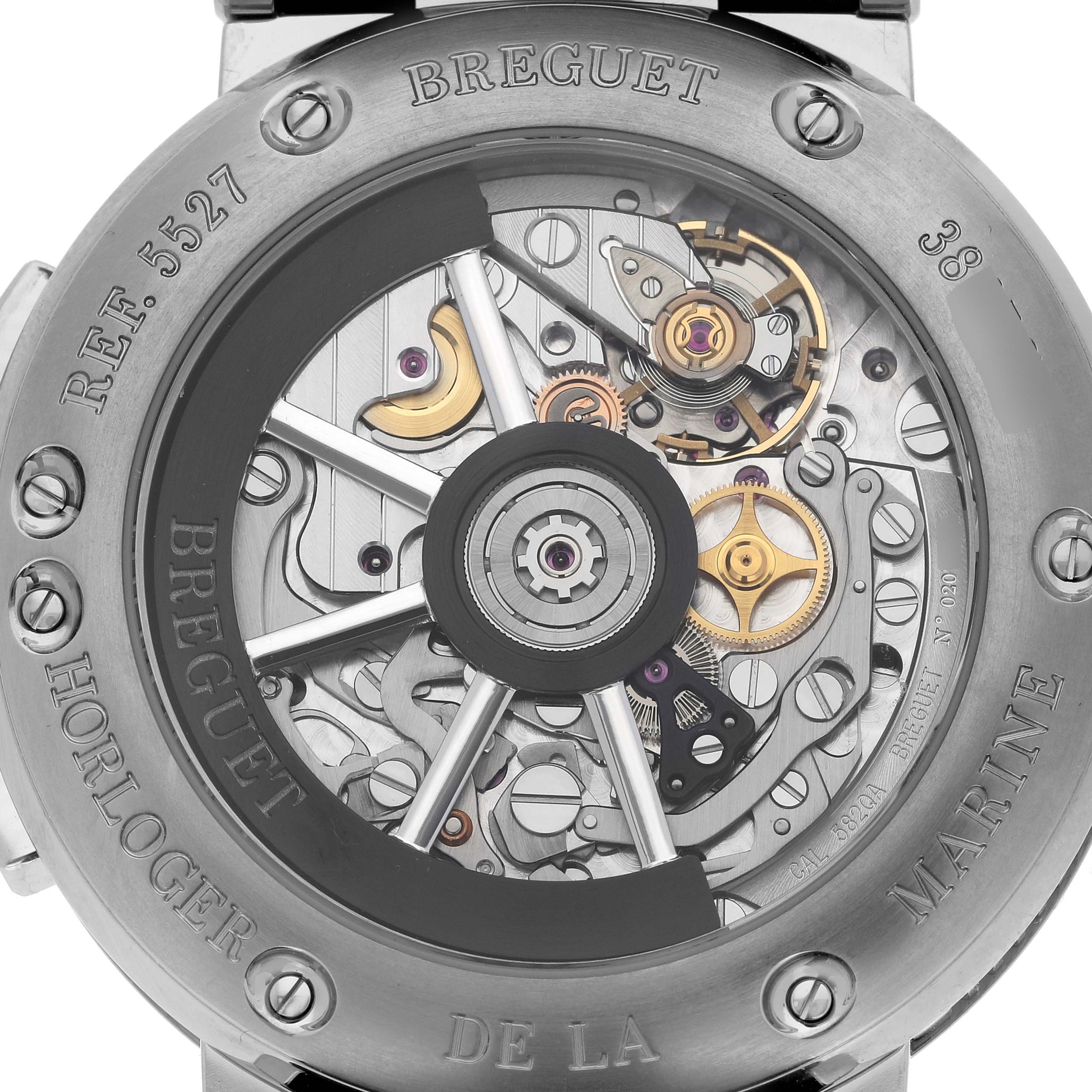 The image shows the back case of the Breguet Marine 5527TI/G2/9WV Men's Titanium Grey Dial 5527TI/G2/9WV Men's Titanium Grey Dial model, revealing its intricate movement and assembly.