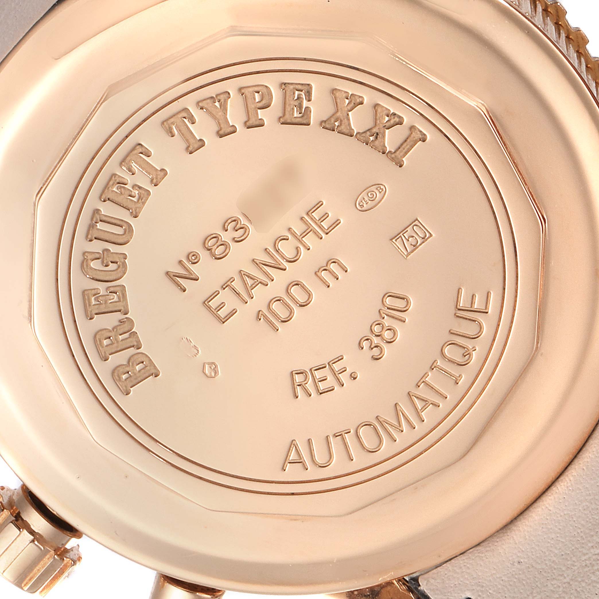 This image shows the case back of a Breguet Type XXI watch, highlighting its engravings and specifications.