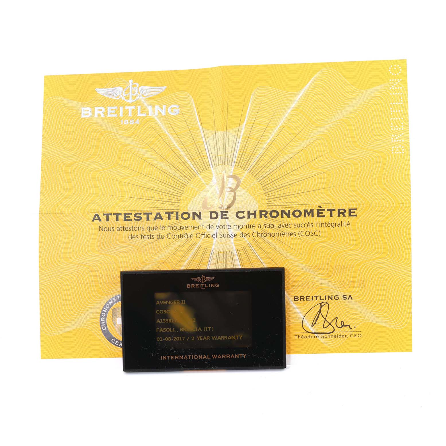 The image shows the warranty card and chronometer certification for a Breitling Avenger A13381 Men's Stainless Steel Black Dial A13381 Men's Stainless Steel Black Dial watch.