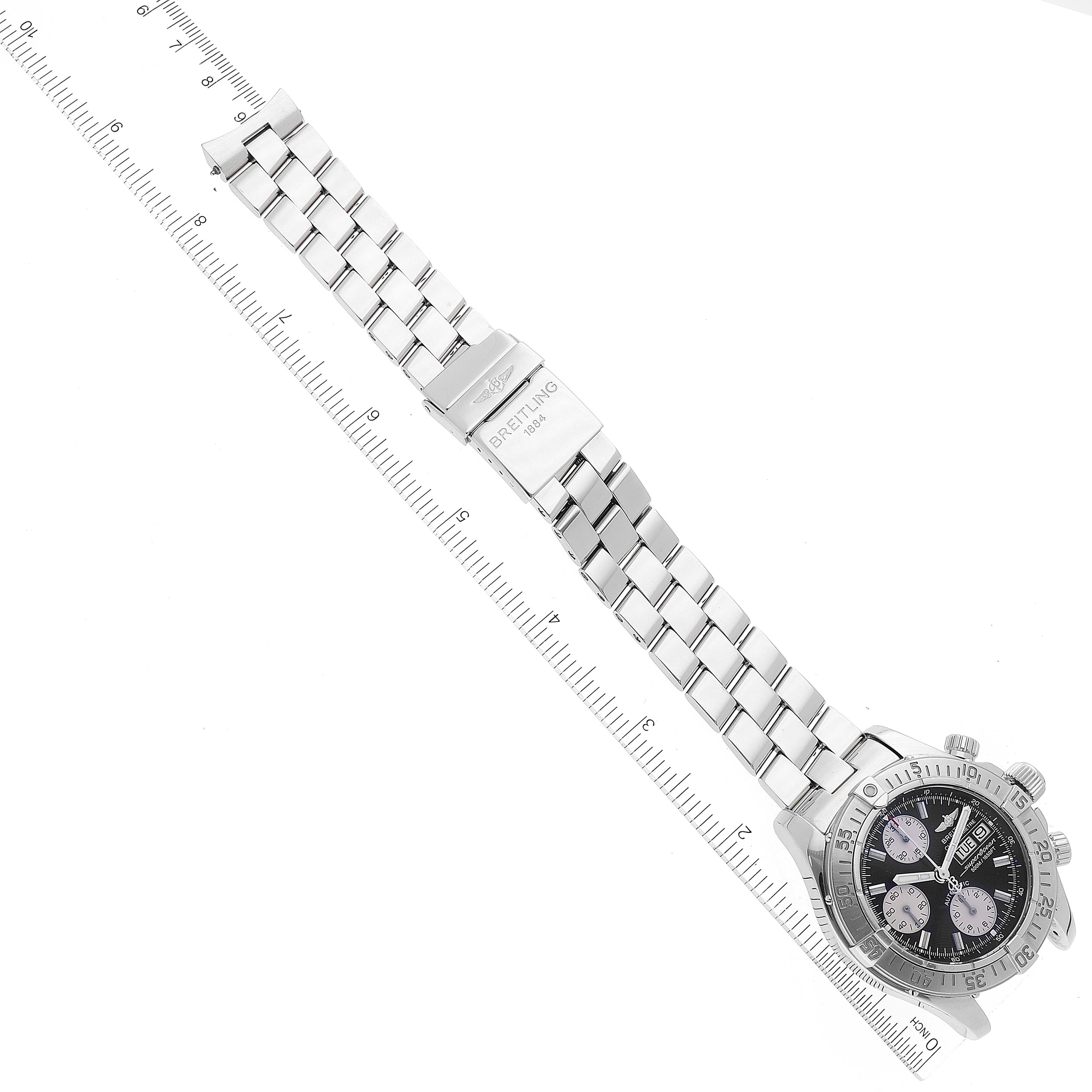 The image shows a Breitling Superocean A13340 Men's Stainless Steel Black Dial A13340 Men's Stainless Steel Black Dial watch laid flat, displaying the watch face, bezel, and stainless steel bracelet with a clasp.