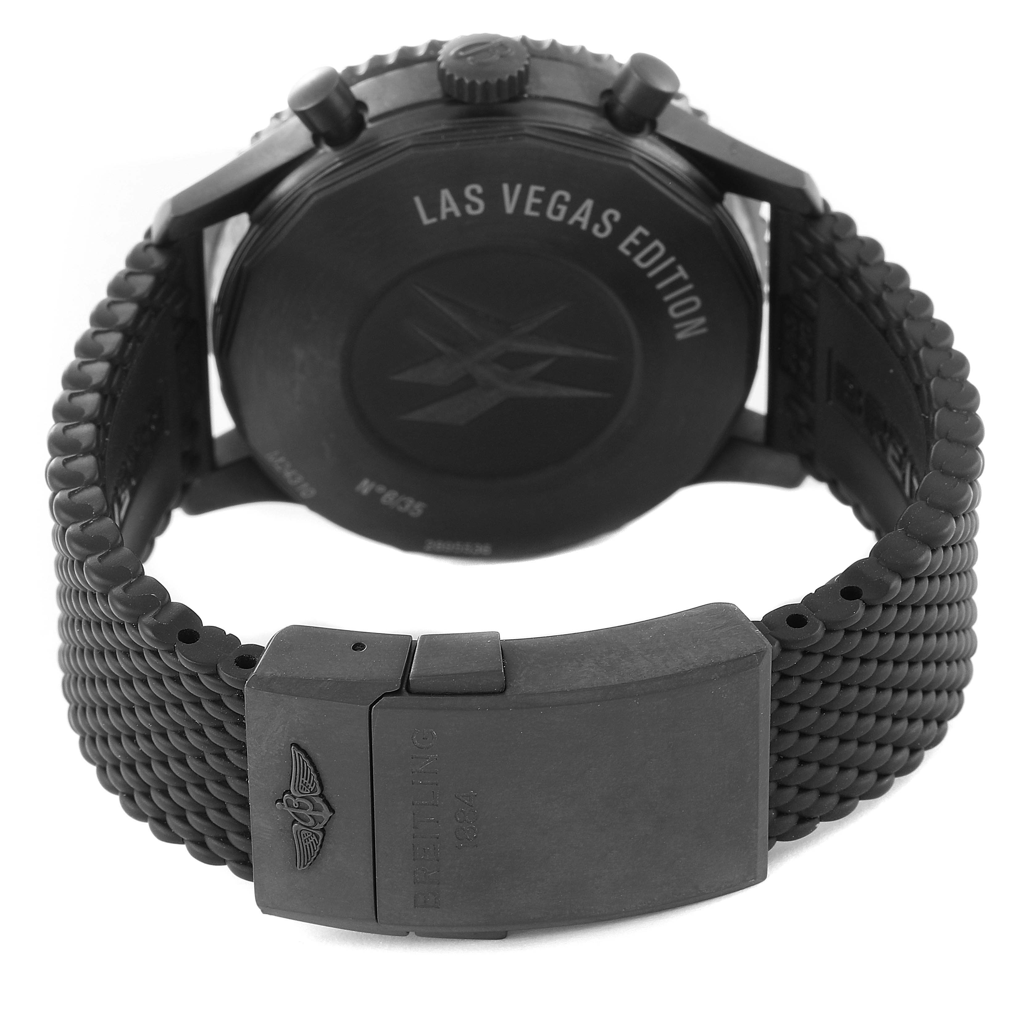 The image shows the back and clasp of a Breitling Chronoliner M24310 Men's Stainless Steel Black Dial M24310 Men's Stainless Steel Black Dial "Las Vegas Edition" watch, highlighting its branded buckle and rubber strap.