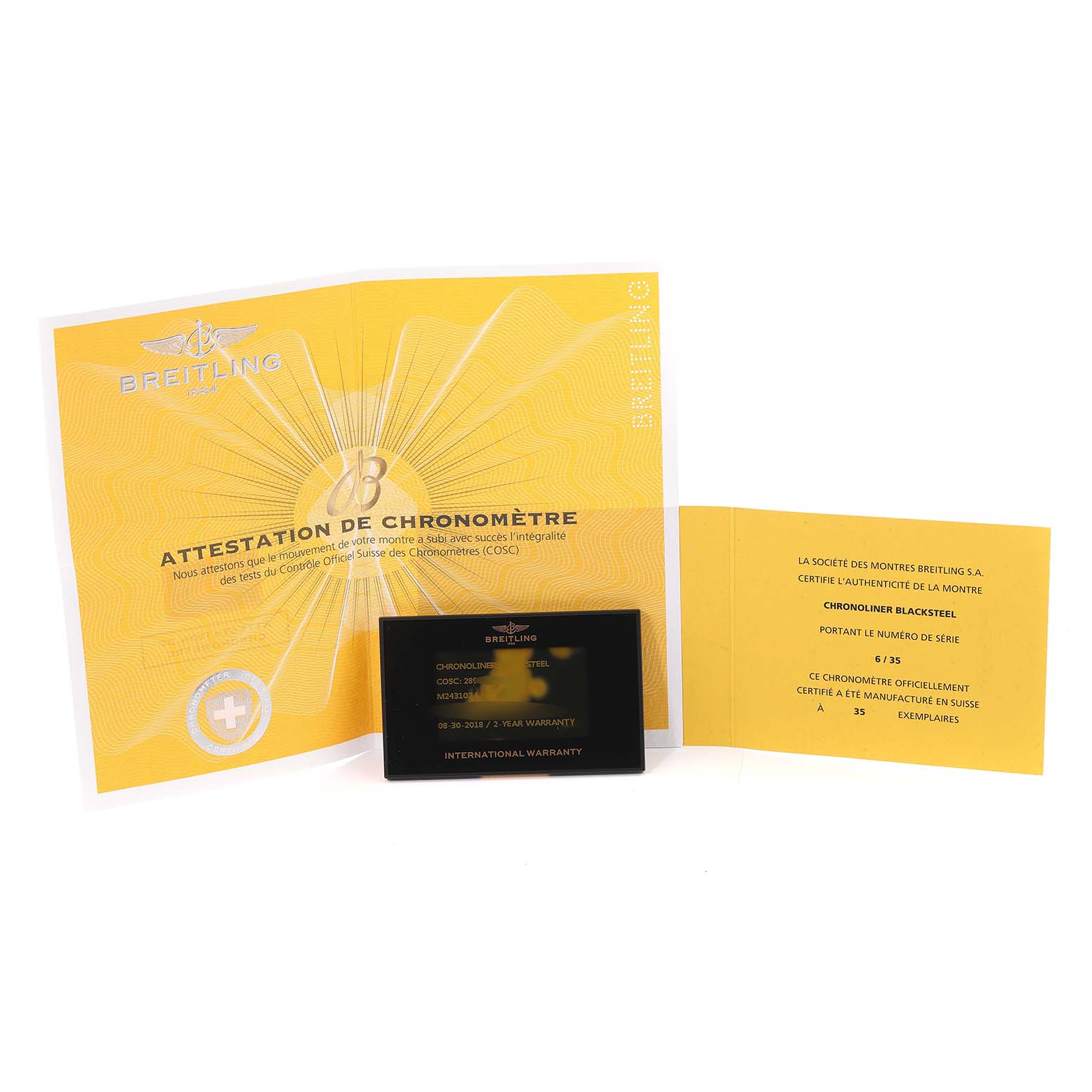 The image shows the warranty card and chronometer certificate for the Breitling Chronoliner M24310 Men's Stainless Steel Black Dial M24310 Men's Stainless Steel Black Dial watch model.